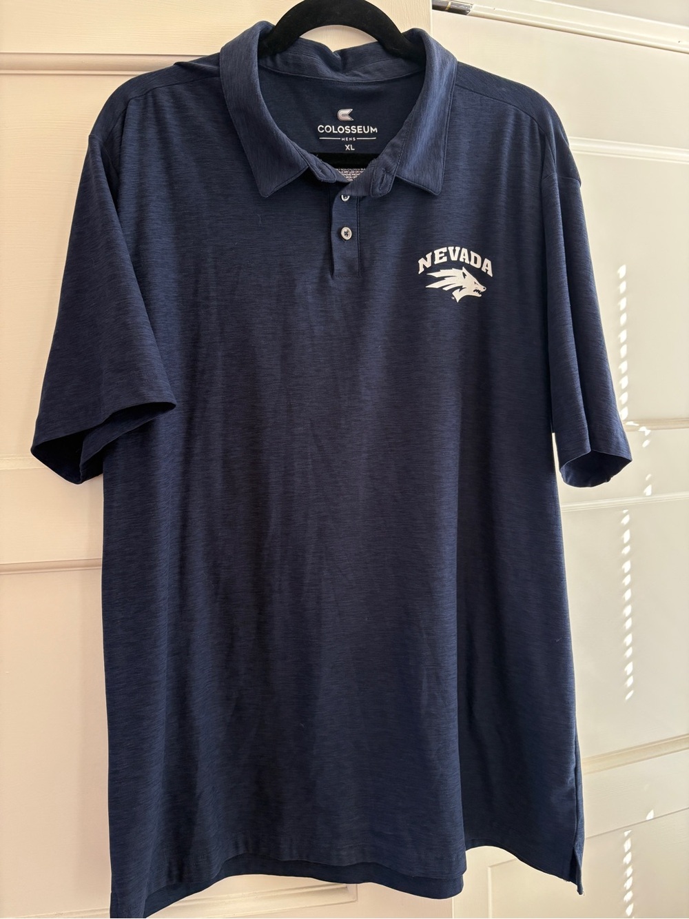 Colosseum Men's Navy Polo with Nevada Wolfpack Logo